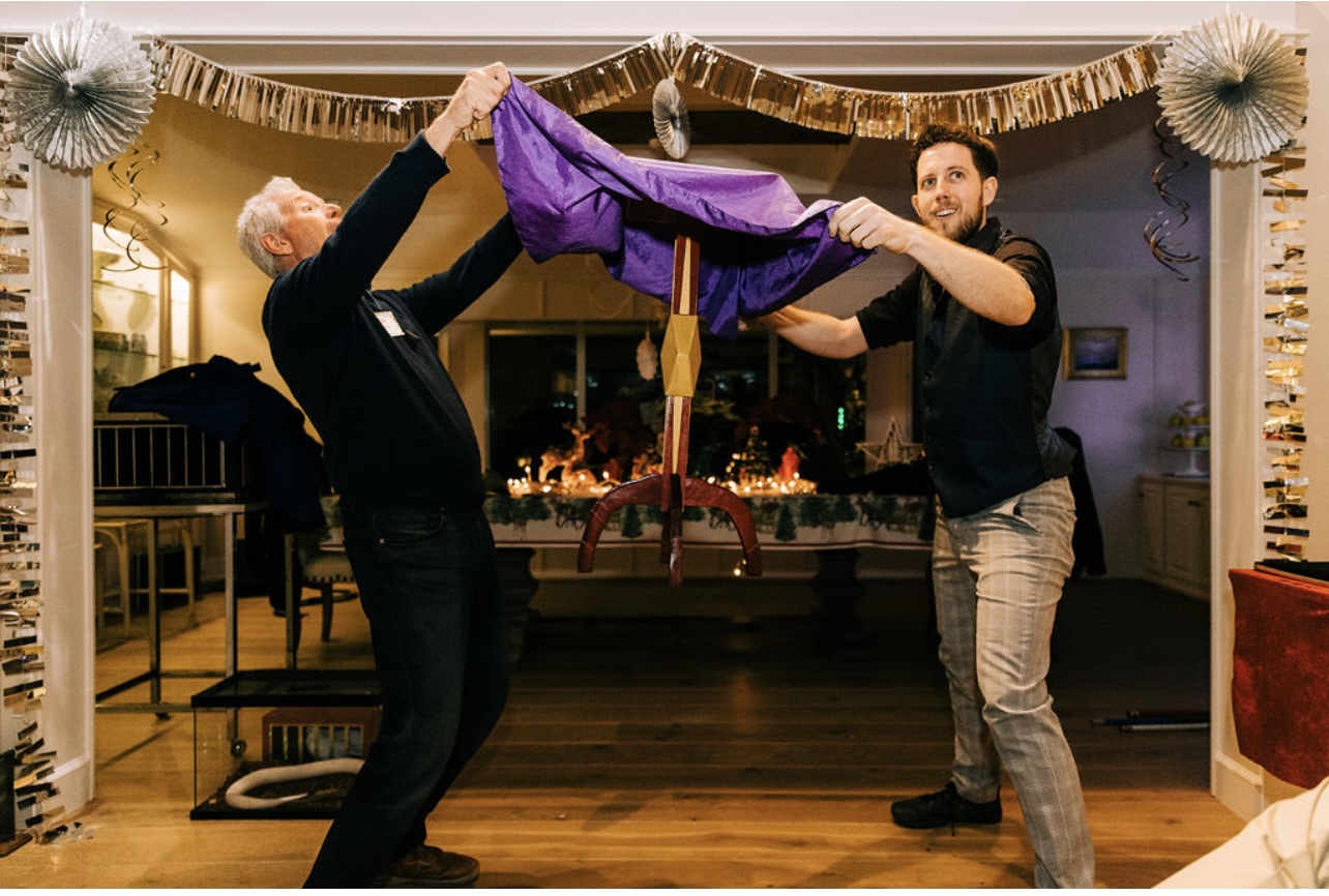 #1 Los Angeles magician for holiday parties performing the floating table illusion