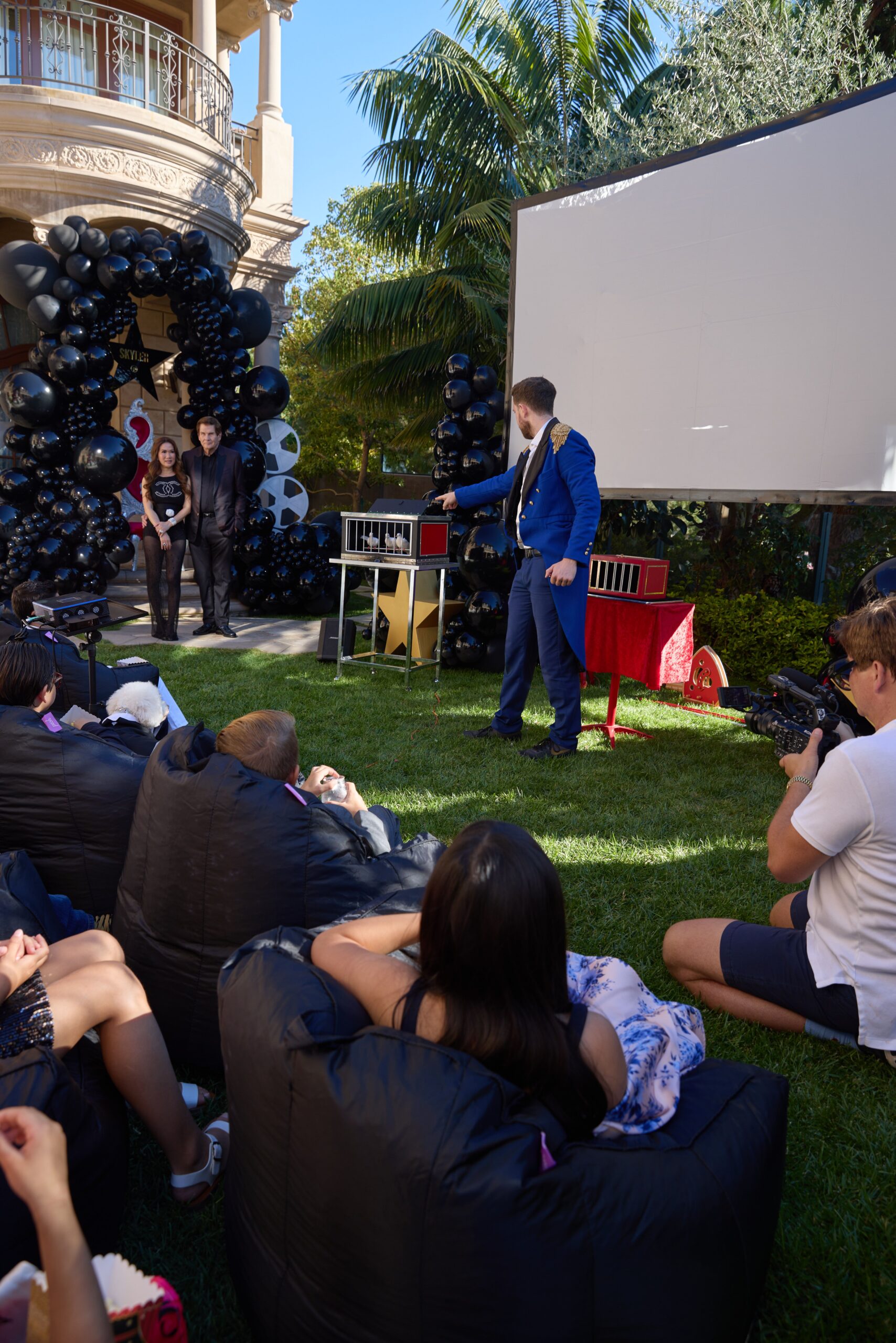 magician in Riverside performing an illusion with doves for a birthday party