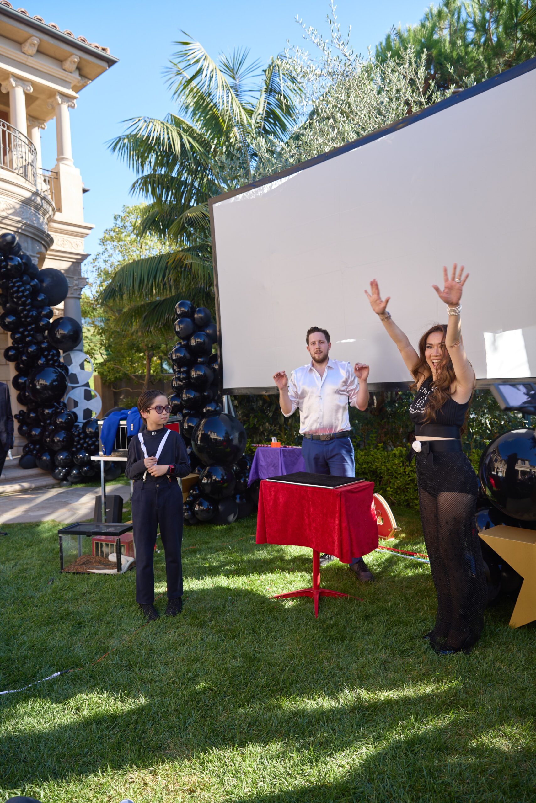 magician performing an audience participation illusion in San Diego.