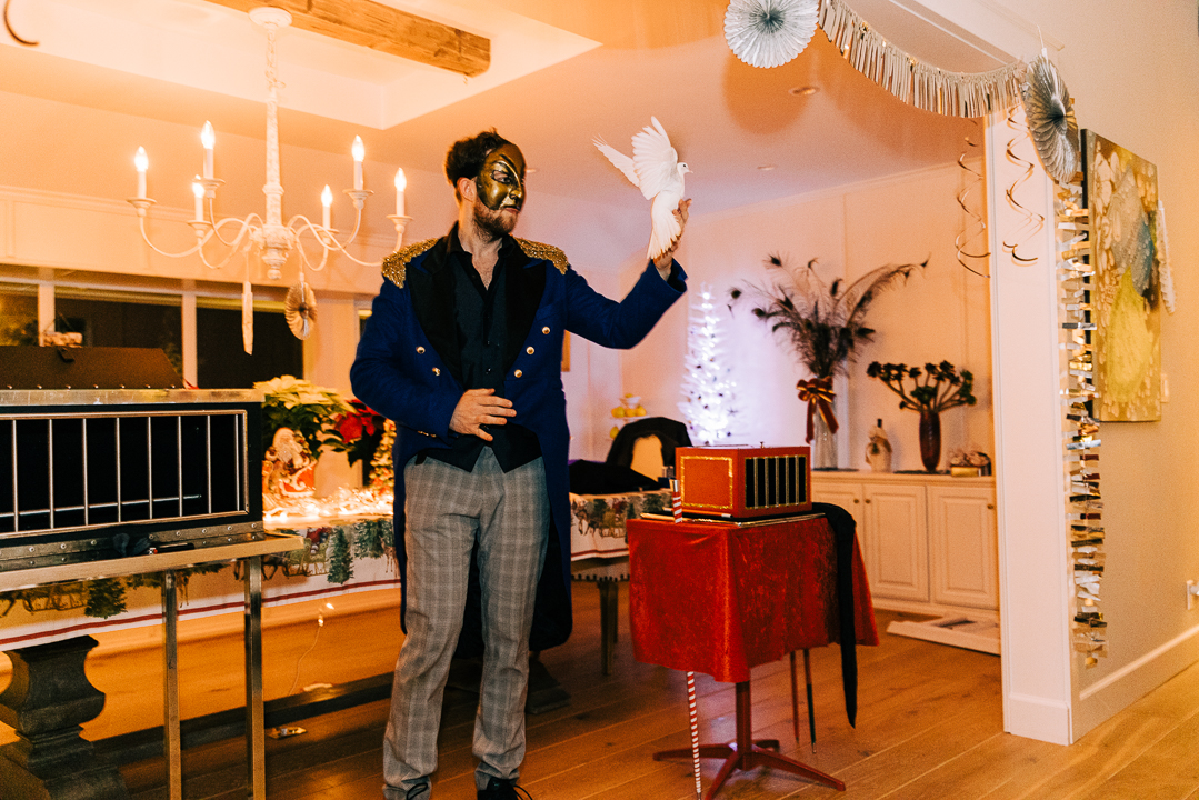 Right before the doves transforms into two birds performed by the top Los Angeles magician for holiday events.