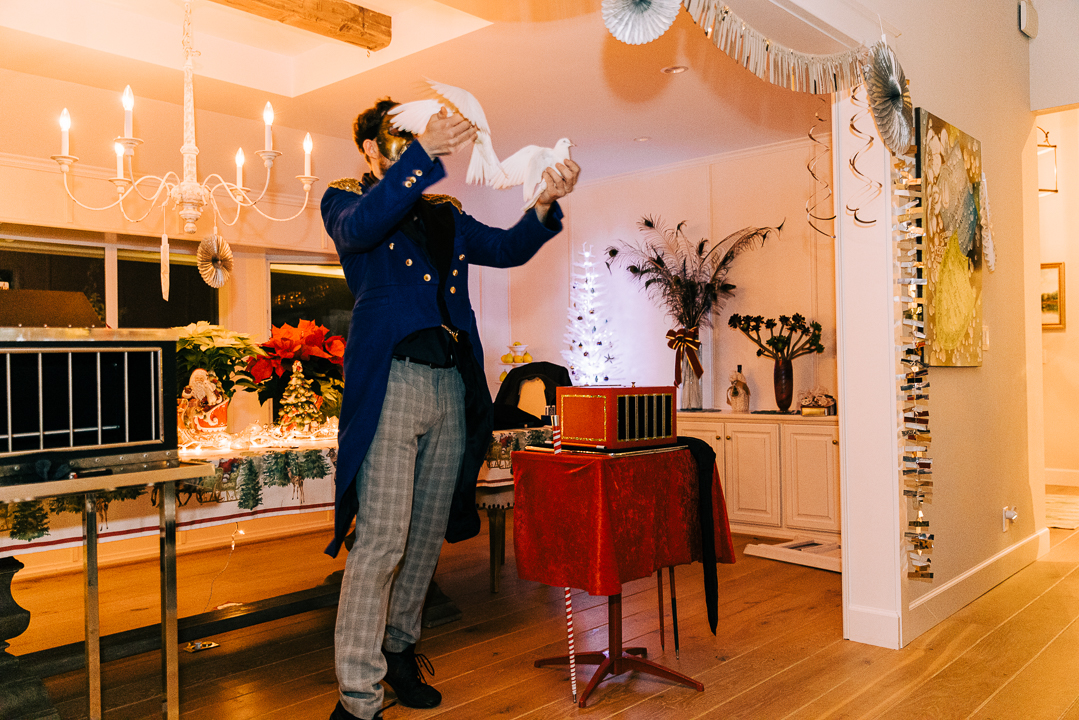 Los Angeles' #1 holiday party magician splitting one dove into two magically.