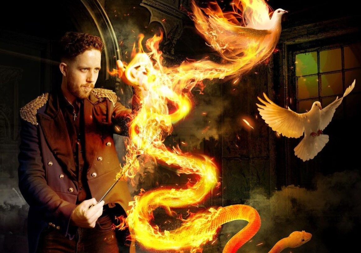 Los Angeles magician performs an illusion with fire and doves.